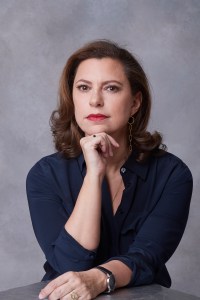 Photo of Monique El-Faizy sitting down